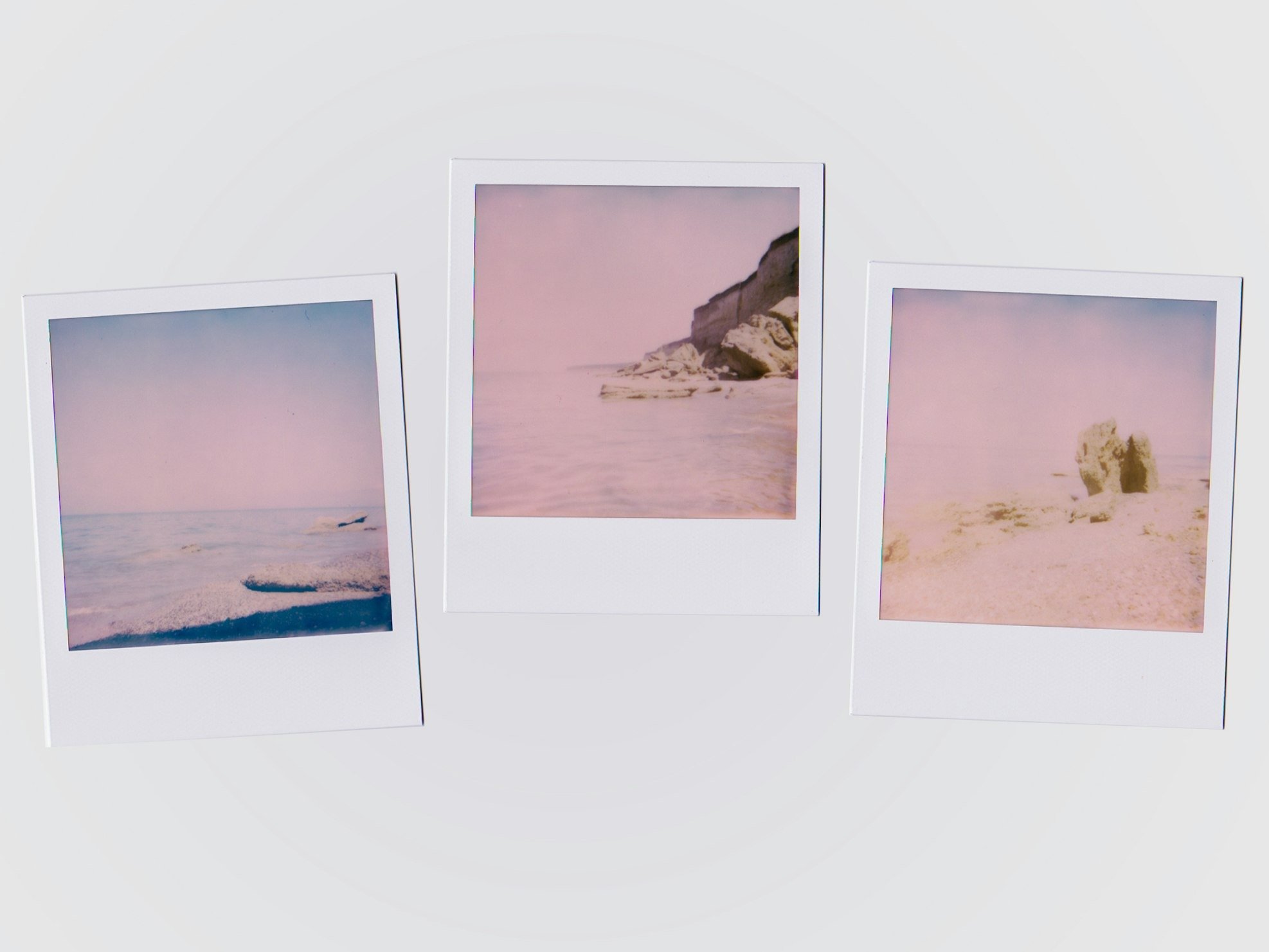 three polaroid photos on the wall
